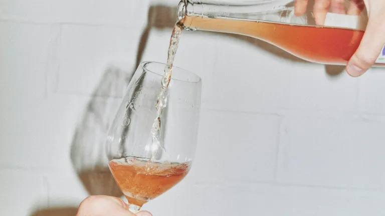 pouring rosé wine