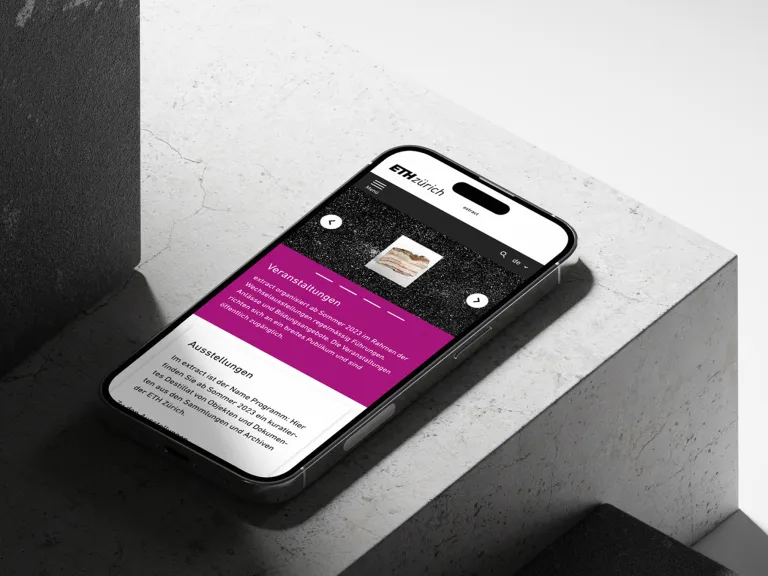 a mobile phone displaying information of an ETH Extract exhibition