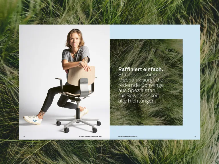 A woman is sitting facing backwards on the WiChair by Wilkhahn. Next to her is a product description set against a grass-textured background.